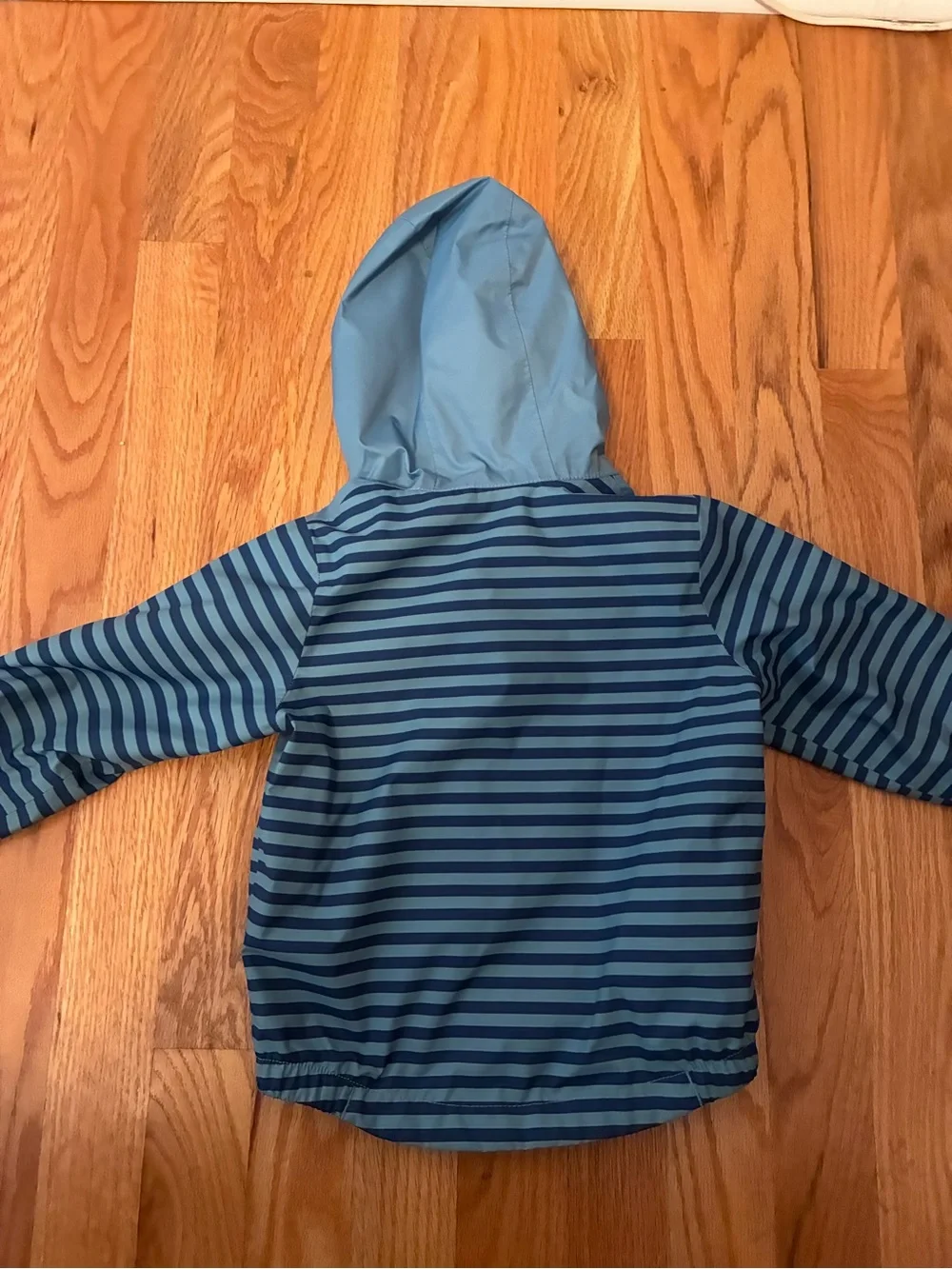The North Face Infant ZIPLINE RAIN JACKET NIAGARA BLUE MINI STRIPE PRINT 6-12 mo